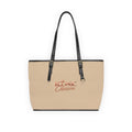 ICONIC Obsession Signature Tote in champagne, front view with rose-gold crown logo and black handles