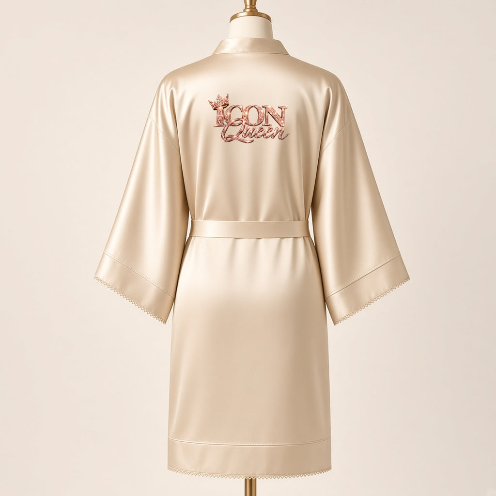 ICON Queen satin robe in champagne, back view with the large rose-gold ICON Queen logo